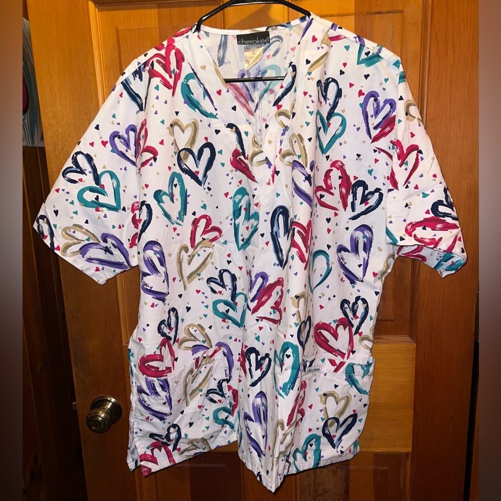 XL Cherokee scrub top. White with multicolored hearts